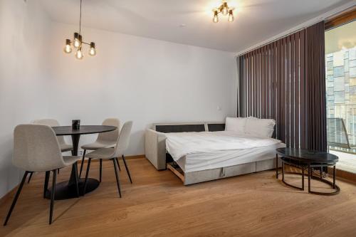 Ένα ή περισσότερα κρεβάτια σε δωμάτιο στο Moderne 2 - Roms Leilighet i Vannkunsten Syd