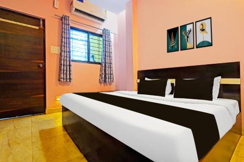 Postel nebo postele na pokoji v ubytování HOTEL O STAR PALACE