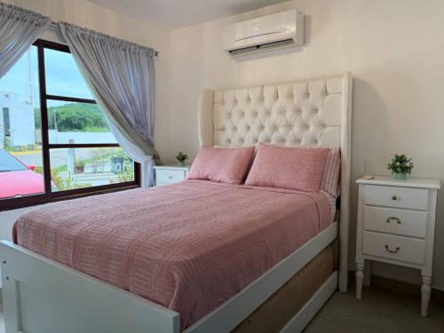 Giường trong phòng chung tại Depa Agradable en Cerritos, Cerca de la Playa