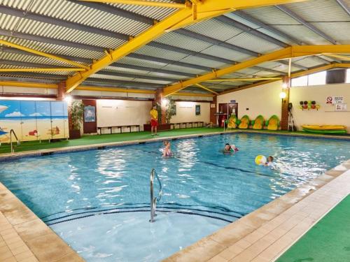 a group of people in a swimming pool at 159 Summerfields in Great Yarmouth