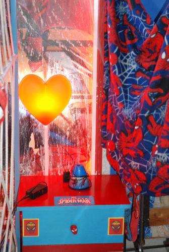 a room with a heart on the side of a wall at Catania SpidermanHouse I in CTA