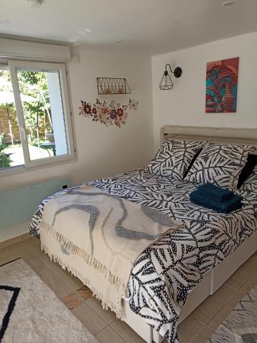 Postel nebo postele na pokoji v ubytování L'océane