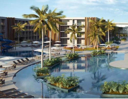 Porto 2 life Resort Muro Alto في إيبوجوكا: منتجع فيه نخيل وكراسي ومبنى