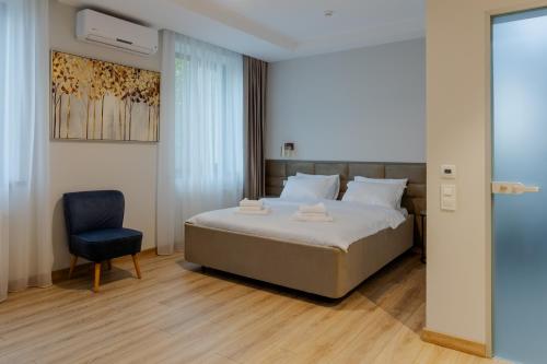 Llit o llits en una habitació de d'or Hotel