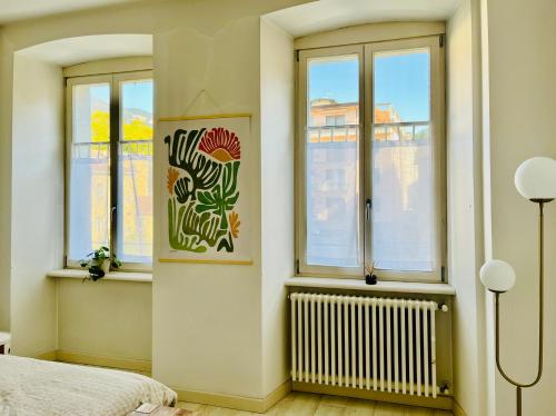 Ένα ή περισσότερα κρεβάτια σε δωμάτιο στο New! La Corte, vicino al Duomo