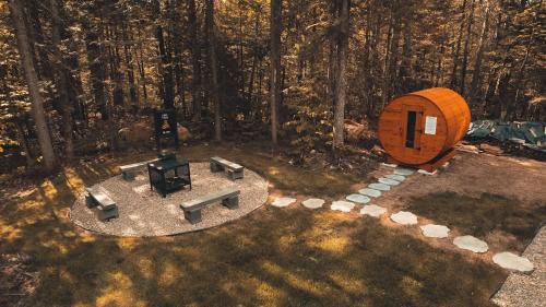an overhead view of a circular building in the woods at Two Zen Houses - Villas and Spas in Morin Heights