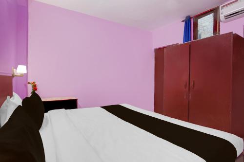 Postel nebo postele na pokoji v ubytování Hotel O Green Park Residency 2