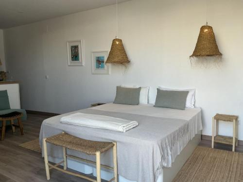 Ένα ή περισσότερα κρεβάτια σε δωμάτιο στο Casa Amarela Alojamento Local