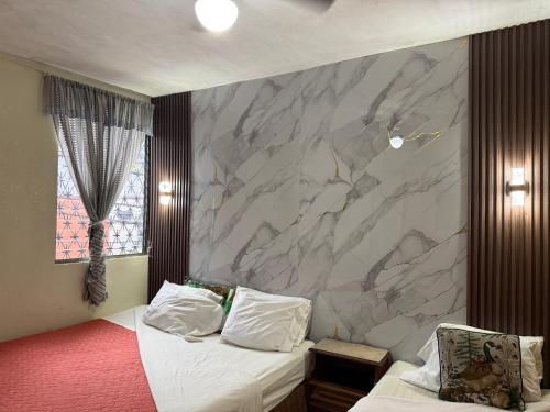 เตียงในห้องที่ Hotel Metropolitano