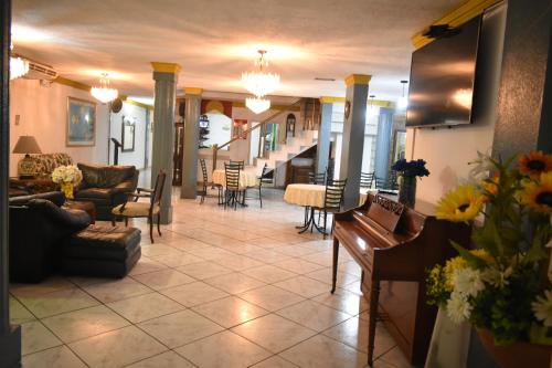 Χώρος καθιστικού στο Hotel Ida María