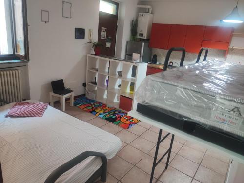 Ένα ή περισσότερα κρεβάτια σε δωμάτιο στο Leo House