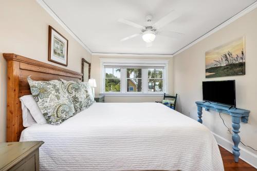 Postel nebo postele na pokoji v ubytování 4 Coast - Seagate Cottage