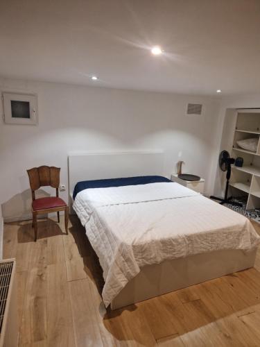 Ένα ή περισσότερα κρεβάτια σε δωμάτιο στο Appartement Victoire