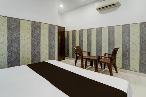 Postel nebo postele na pokoji v ubytování Hotel O Vivanta Resorts