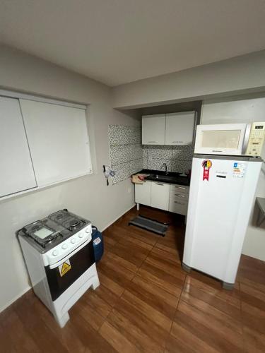 Kuchyň nebo kuchyňský kout v ubytování Loft privativo prox. Shopping