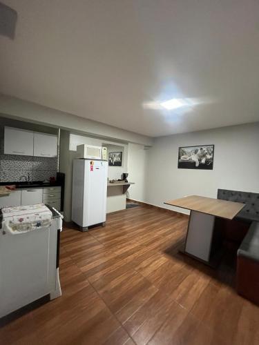 Kuchyň nebo kuchyňský kout v ubytování Loft privativo prox. Shopping