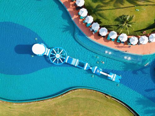 an aerial view of a water park with a roller coaster at Sofitel Krabi Phokeethra Golf and Spa Resort in Klong Muang Beach
