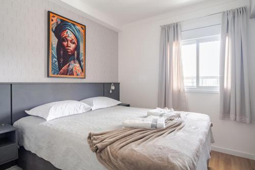 En eller flere senge i et værelse på Descanse perto da USP - HRAC - Facop e Shopping Bauru