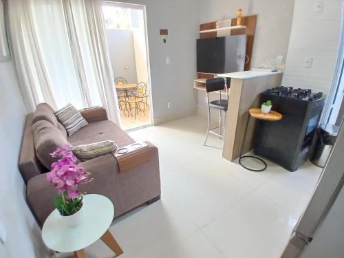 Χώρος καθιστικού στο Casa c AR - condomínio prox ParkShopping Cpo Grande - camas de casal e solteiro