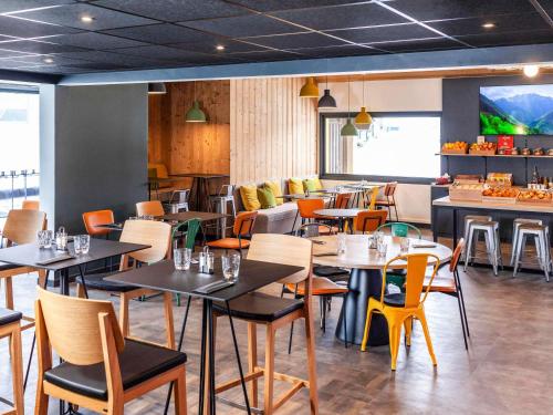 Un restaurante o sitio para comer en Ibis Pontarlier