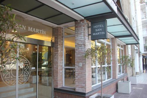 a store front of a building with a sign on it at Hotel San Martín in Mendoza