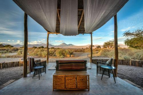 a view of the desert from the porch of a safari tent at Casita La Brea in San Pedro de Atacama
