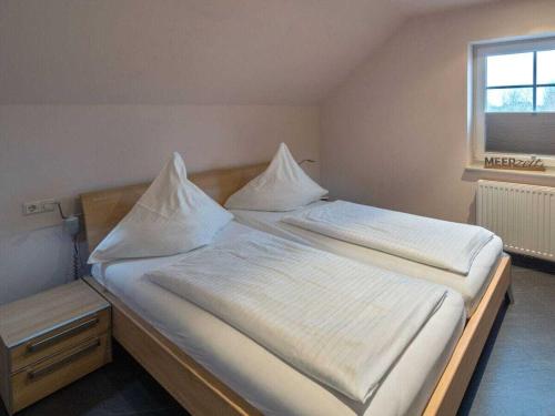 Ένα ή περισσότερα κρεβάτια σε δωμάτιο στο 1-bedroom holiday home