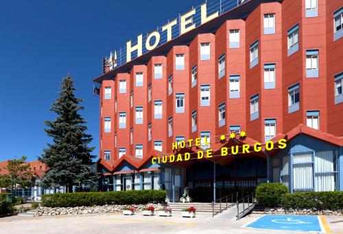 a hotel building with a sign on it at Spirit Hotel Ciudad de Burgos in Rubena