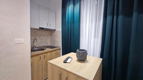 Virtuvė arba virtuvėlė apgyvendinimo įstaigoje Coco's Apartment