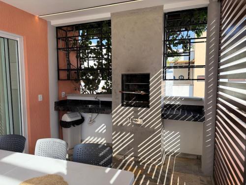 TV/trung tâm giải trí tại Flamingos Pipa 09 - Jacuzzi e piscina