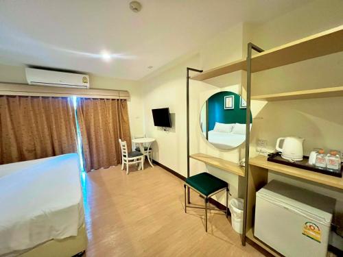 Lova arba lovos apgyvendinimo įstaigoje Klean Residence Hotel
