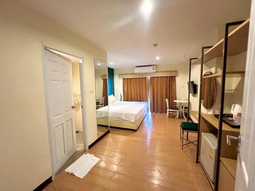 Lova arba lovos apgyvendinimo įstaigoje Klean Residence Hotel