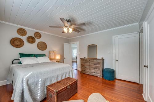 a bedroom with a bed and a ceiling fan at Walk to Dtwn Hahira Inviting Home with Pool and Yard! in Hahira