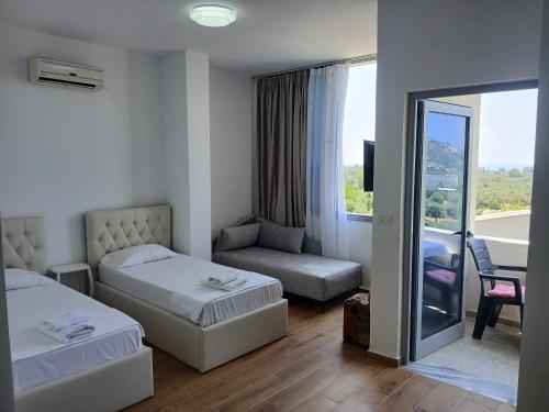 Cama o camas de una habitación en AMANTIUS APARTMENTS