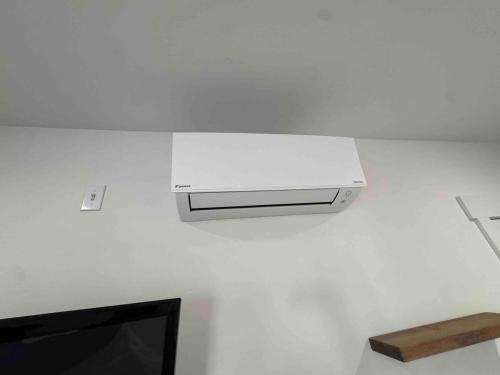 a white air conditioner on a white wall at New Luxury 1BR ADU Near Downtown & Tech Hubs in San Jose