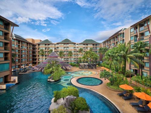 an aerial view of a resort with a swimming pool at Novotel Phuket Vintage Park Resort in Patong Beach