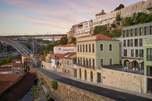 a view of a city with a bridge in the background at Origine Porto Gaia, a Tribute Portfolio Hotel in Vila Nova de Gaia