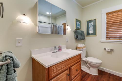a bathroom with a sink and a toilet at Route 66 Retreat Dog-Friendly Home in Williams in Williams