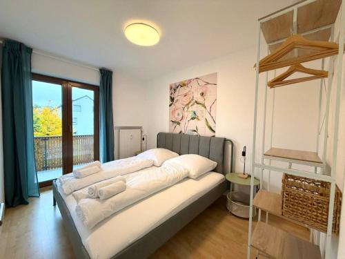 Postel nebo postele na pokoji v ubytování Perfekt für 4-6! Küche Garage Nespresso S-Bahnhof