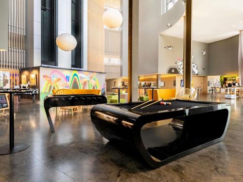Khu vực ghế ngồi tại Pullman Sao Paulo Guarulhos Airport