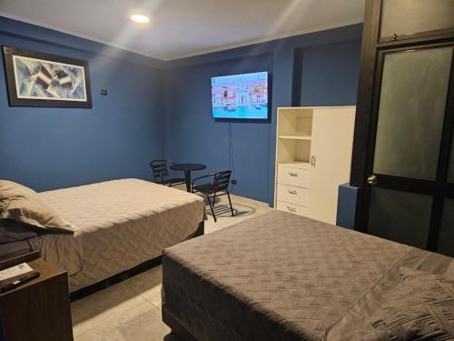Postel nebo postele na pokoji v ubytování Hotel Dreams Barranca