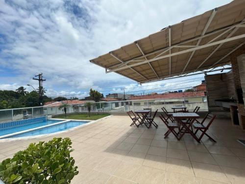 Bazén v ubytování Apartamento mobiliado com excelente localização em Maceió nebo v jeho okolí