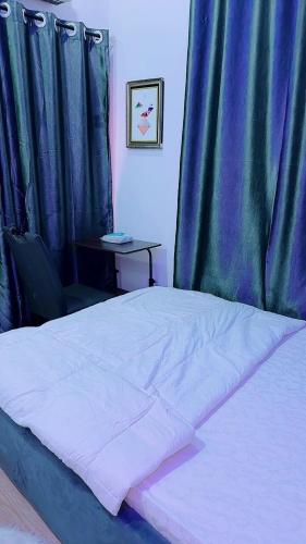 Ένα ή περισσότερα κρεβάτια σε δωμάτιο στο Luxe Cozy Comfort