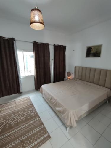 Ένα ή περισσότερα κρεβάτια σε δωμάτιο στο La Maison des Cœurs - Appart Chic