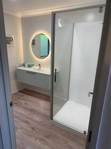 a bathroom with a shower and a sink at Entire home in Roxburgh in Roxburgh