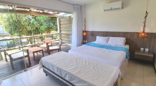 Voodi või voodid majutusasutuse Villas do Pratagy Resort toas