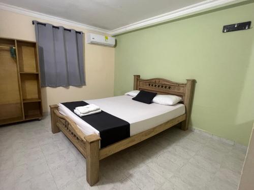 Postel nebo postele na pokoji v ubytování Hotel Georgina
