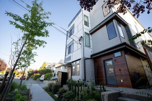 a house on the side of a street at Seattle Townhouse with Rooftop Deck in Ballard in Seattle