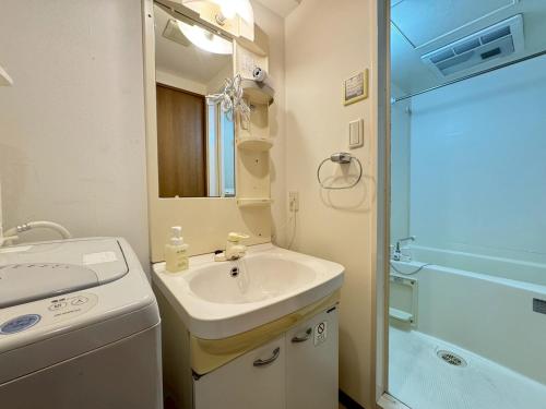 Koupelna v ubytování Sakura Sands Hotel