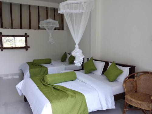 Ένα ή περισσότερα κρεβάτια σε δωμάτιο στο Ella Lucky Panoramic